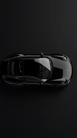 Black sports coupe top view against dark studio background.