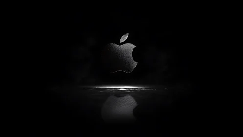 Apple's Iconic Symbol Glows in Darkness and Reflection.