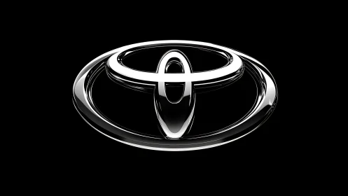 High-gloss chrome automotive emblem on deep black background