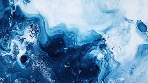 Abstract blue and white fluid art painting with swirling patterns.