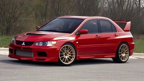 Red Mitsubishi Lancer Evolution parked on quiet suburban road