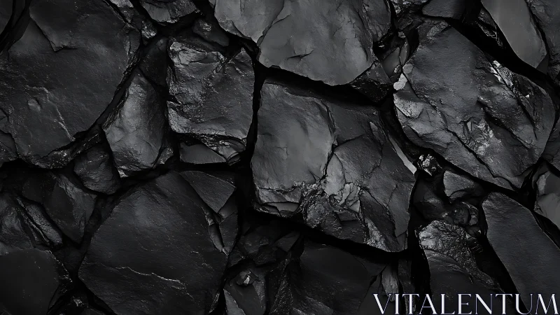 Midnight shale mosaic of fractured obsidian shadows.