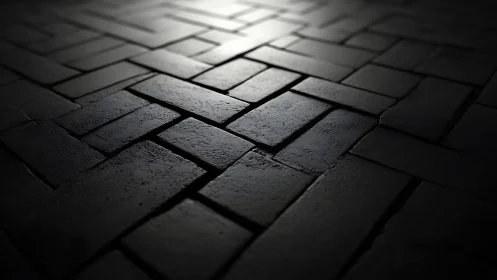 Dark textured brick pavement glows with soft overhead light.