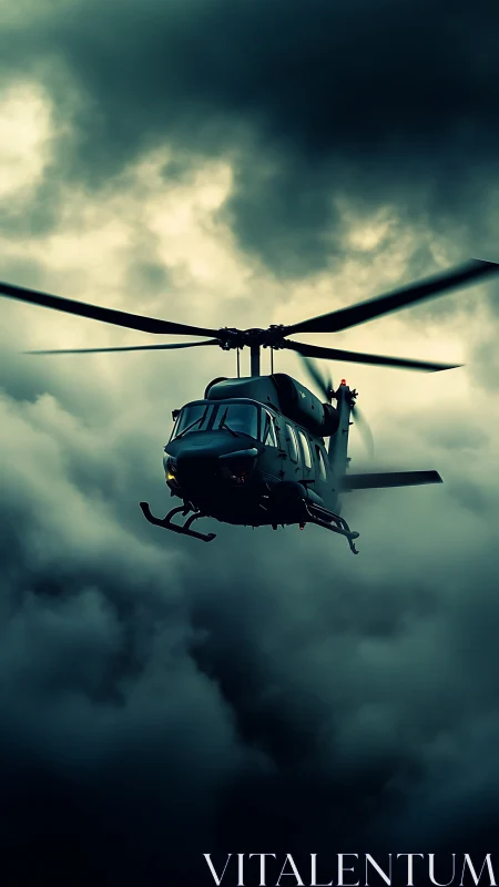 Military helicopter flying through dark storm clouds.