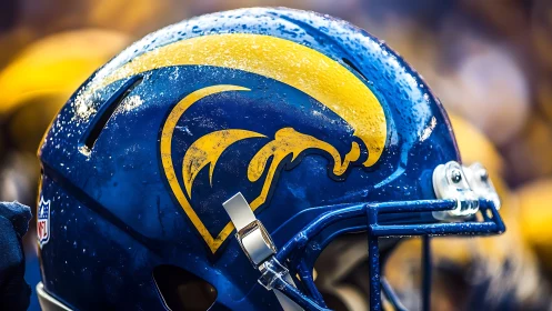 Close-up view of blue and yellow American football helmet.