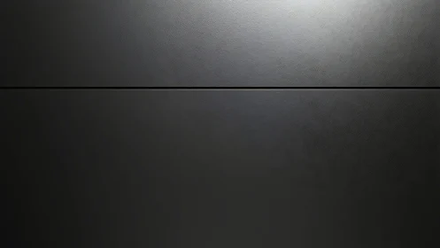 Minimalist dark metal panels intersect under soft overhead light