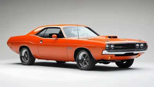 Orange classic muscle car in studio on neutral backdrop.