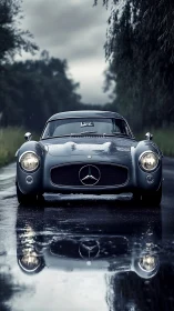 Rainy road classic car poised above a mirror of puddles.