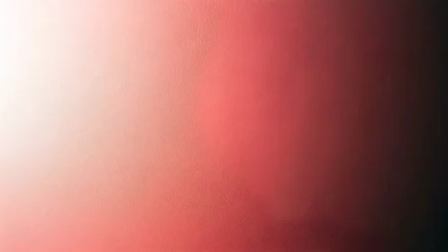 Soft red gradient background with subtle textured surface.