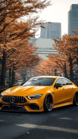 Lowered yellow Mercedes sedan on city street in autumn.