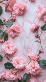 Soft roses drift like pastel constellations on pale marble