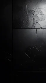 Dark slate wall panels catch light in subtle fractured textures.