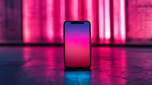 Smartphone Display Glowing Against Neon Pink Backdrop.