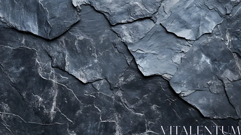 Natural dark slate stone texture with rugged, layered appearance.