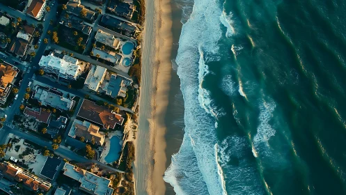 Orthographic coastal grid contrasts urban blocks with dynamic surf