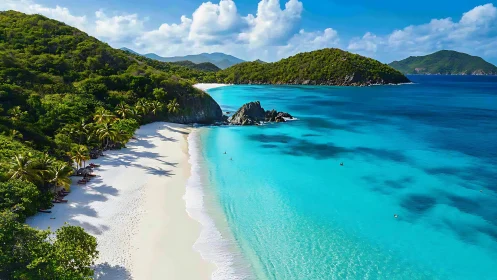 Tropical Beach Cove with Turquoise Waters and Green Island.