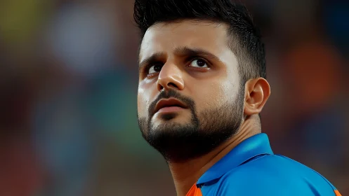 Focused cricket player portrait under stadium lights.