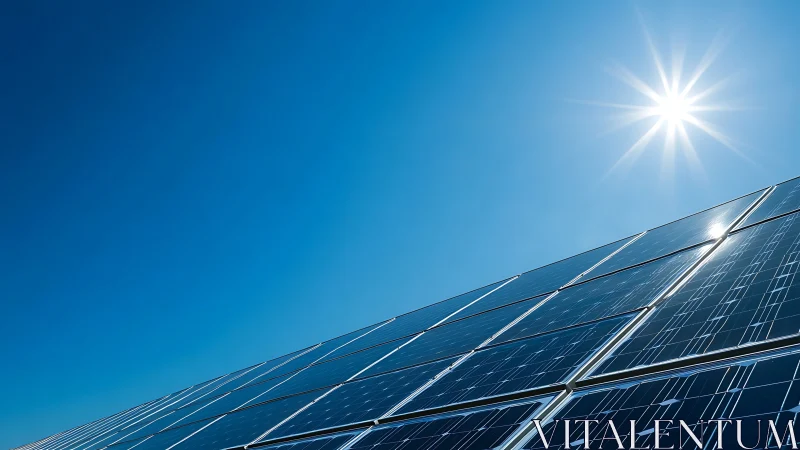 Angled solar panel array under intense midday sun flare