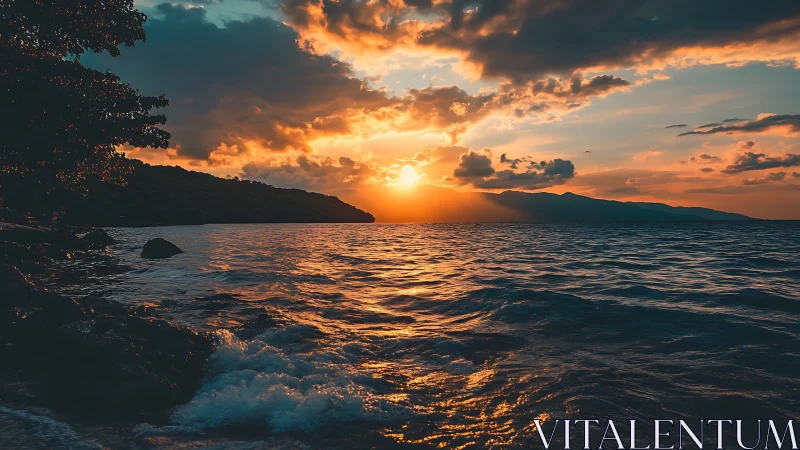 Coastal shoreline and distant hills under low sun horizon.