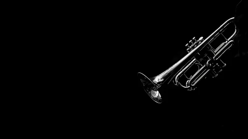 Silver trumpet glows dramatically against deep black void