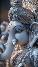 Highly detailed Ganesh idol with ornate metallic ornamentation