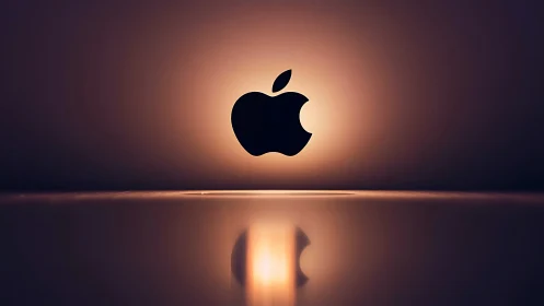 Backlit fruit-shaped logo icon glows above reflective surface