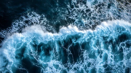 Rolling turquoise waves captured in a peaceful sea moment.