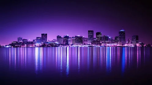 Neon illuminated city skyline reflected over calm water.