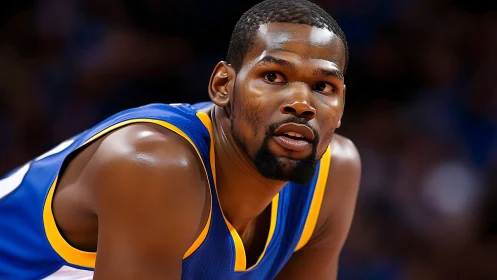 Close-up sideline portrait of focused basketball player, arena