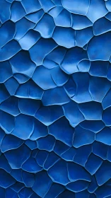 Layered blue polygonal cells form a fluid abstract surface