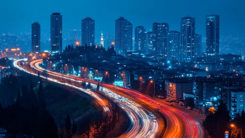Ribboned night highway under cool electric towerscape.