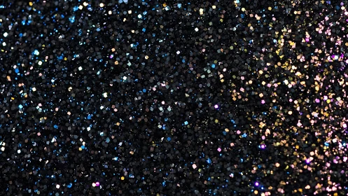 Black glitter background with multicolored sparkles, macro style.