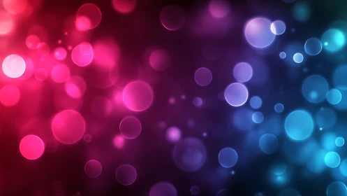 Glowing pink and blue bokeh lights in a dreamy soft blur.