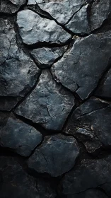 Weathered dark stone texture with deep, moody character.