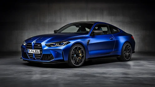 Studio-lit blue performance coupe in front three-quarter view.