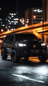 Midnight black SUV under urban overpass lights at night.