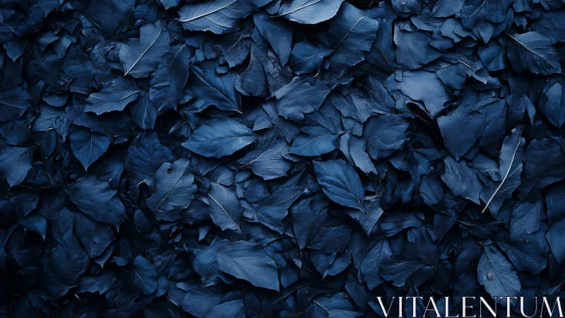 Monochrome blue dried foliage forms dense overlapping leaf texture