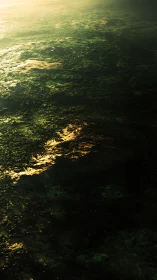 Sunlit alien ocean glows under hazy atmospheric light.