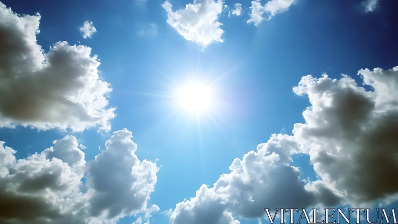 Radiant midday sun breaks through soft billowing clouds