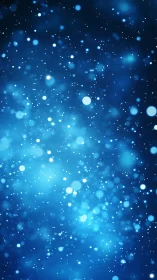 Blue bokeh particle field with shallow depth and soft glow