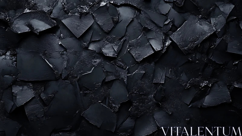 Shattered black slate texture creates dramatic abstract depth