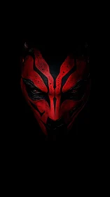 Red horned mask emerges from deep shadowed darkness.