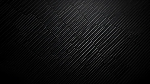 Diagonal carbon-fiber surface shows matte ridged microtexture