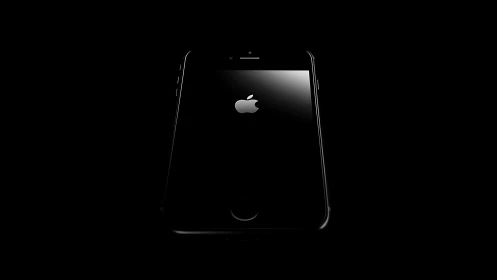 iPhone loading screen with Apple logo against black background