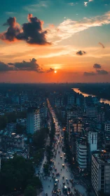 Vertical cityscape at sunset with leading-line traffic axis.