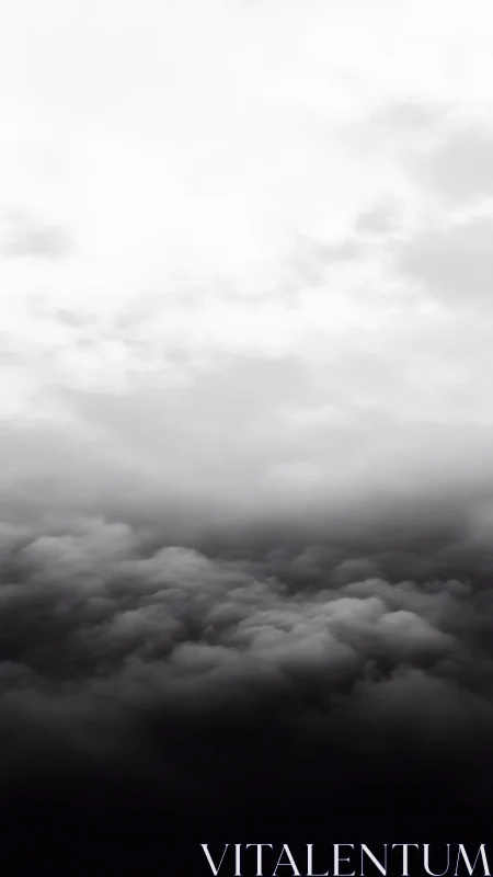 Monochrome cloud layers form a vertical gradient in frame