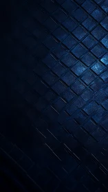 Grid-like textured blue surface is illuminated at an angle