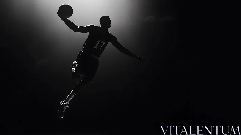 Silhouetted basketball player captured midair under focused backlight