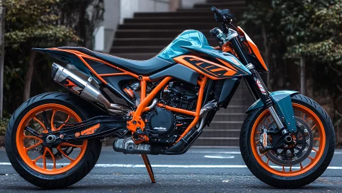 KTM streetfighter motorcycle in teal and orange livery profile.