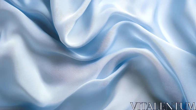 Close-up of light blue fabric folds with soft surface texture.